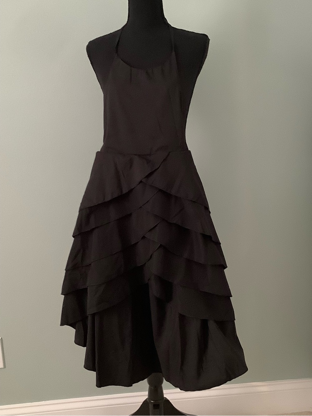 Black Tiered Ruffle Party Dress with spaghetti straps.